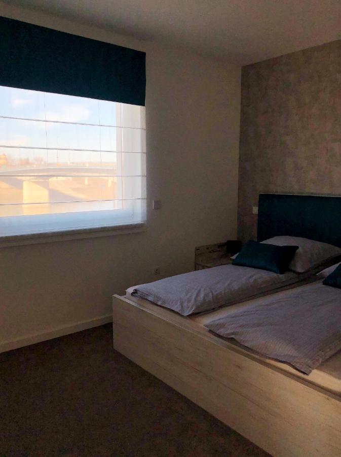 Moment Apartments Сольнок Экстерьер фото